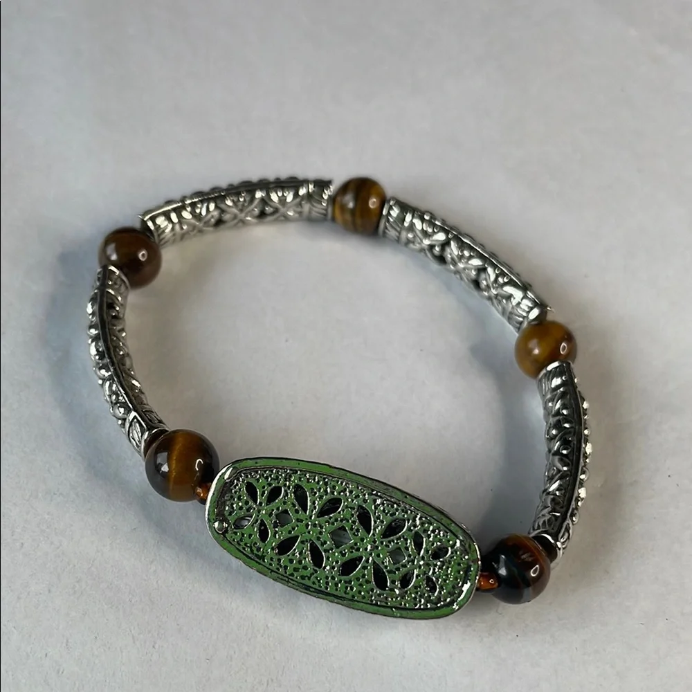 Silver and Brown Beaded Bracelet with Ornate Charm